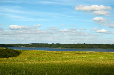 Landscape in Holbaek municipality overlooking the Munkholm Bridge on the other shore. Vipperod...