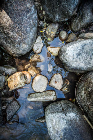 A lot of stone in the waterの写真素材