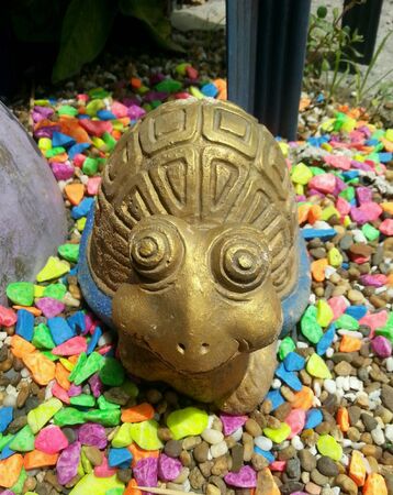Turtle statue on stoneの素材