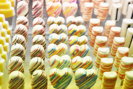 Handmade colorful chocolate sweet, food background.