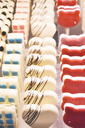 Handmade colorful chocolate sweet, food background.