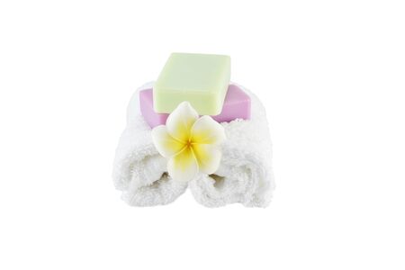 Spa treatment with soap towels and flower on white background with clipping pathsの写真素材