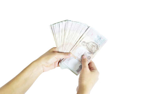 Hand with money isolated on white backgroundの写真素材
