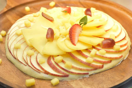 fruit on pizza plate.の写真素材