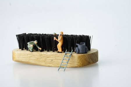 Shoebrush with men miniature workingの写真素材