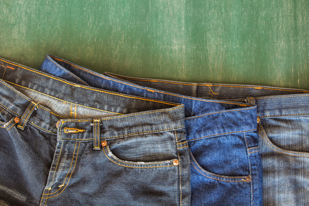 three pattern of jeans with chalkboard backgroundの写真素材