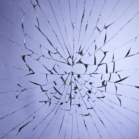 broken  glass purple backgroundの写真素材