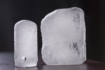 two ecologic alum deodorant crystal in black backgroundの写真素材