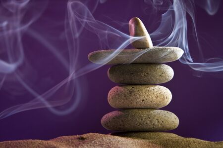 tower of stones and frankincense in the sandの写真素材