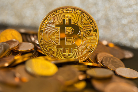 Bitcoin. Cryptocurrency . Gold coin bitcoin on a golden shiny background. virtual money conceptの写真素材