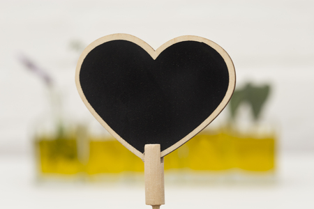 oil essenti herbs and focus in heart backboardの写真素材