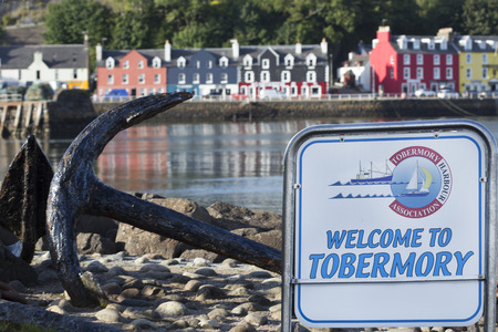 Old anchor with view of Scottish town Tobermory town in the backgroundのeditorial素材