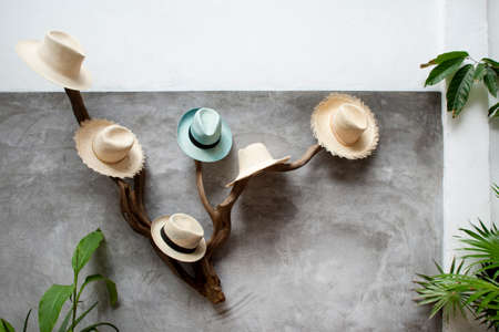 Handmade hats in beautifl wall in tropical spaceの写真素材