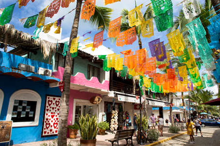 Colourful Mexican flags decorating the town of Sayulita, Mexicoのeditorial素材