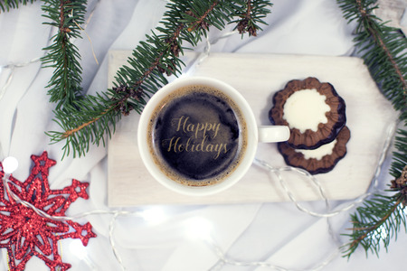 Latte art. Decorated Christmas coffee. Coffee with a text. Top view. Christmas holiday backroundの写真素材