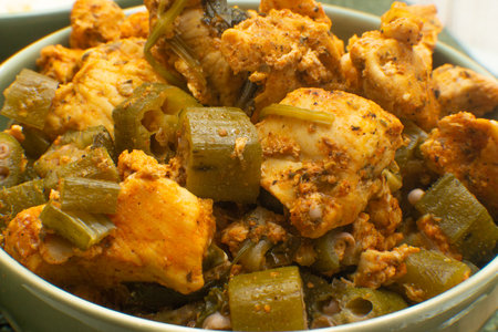 delicious brazilian meal full of piece of chicken and okraの写真素材