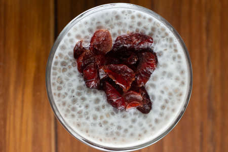 cup full of sizzles with cranberriesの写真素材