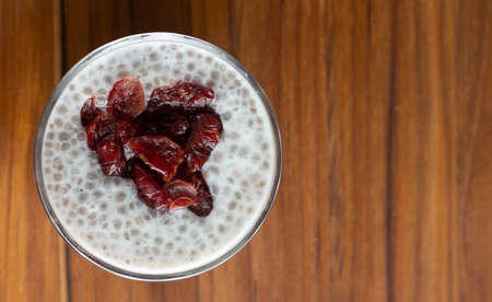cup full of sizzles with cranberriesの写真素材