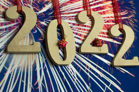 a sign with wooden numbers written 2022の写真素材