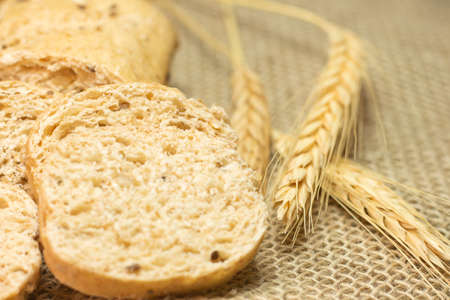 superclose of bread on a straw table
