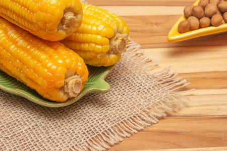 typical Brazilian June food - boiled corn and peanutsの写真素材
