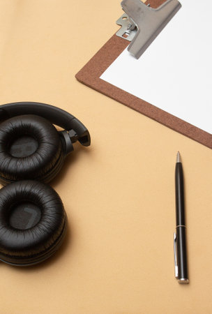 clipboard and smartphone on beige table - officeの写真素材