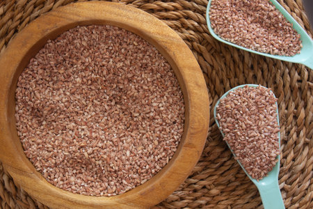 a bowl full of organic and raw rice-foodの写真素材