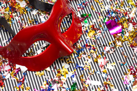 colorful carnival mask on the colorful background with several ornamentsの写真素材