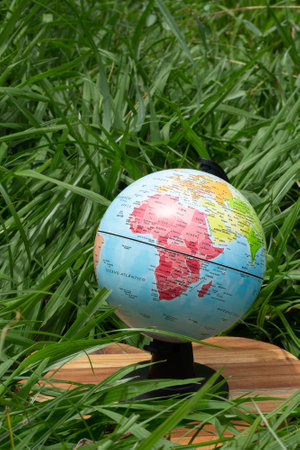 earth globe on green grass showing Africa - earth dayの写真素材