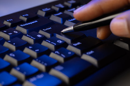 finger typing on a keyboardの写真素材