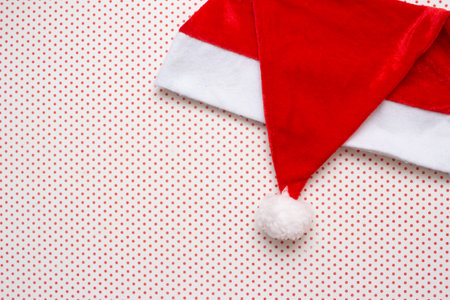 Santa Claus hat with white background and red polka dotsの写真素材