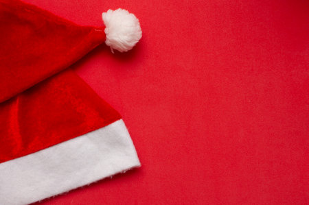 Santa Claus hat with red backgroundの写真素材