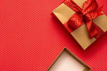 christmas gift boxes with red backgroundの写真素材