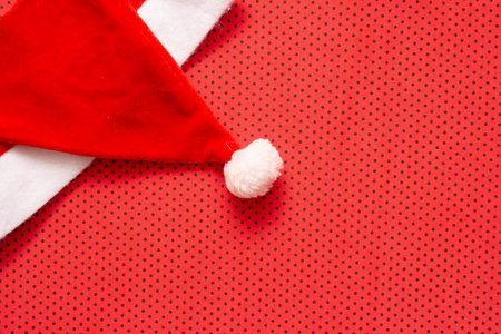 Santa Claus hat with red backgroundの写真素材