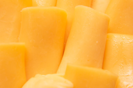 super close up of mozzarella cheese rollsの写真素材