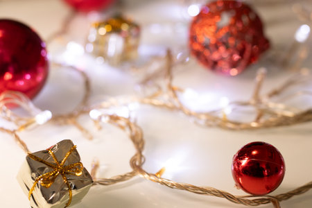 several red Christmas ornaments and lightsの写真素材