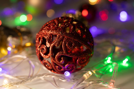 amazing red ball surrounded by colored lightsの写真素材