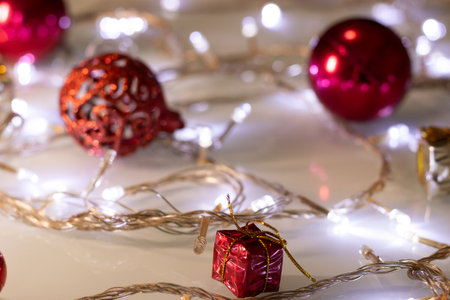 several red Christmas ornaments and boxesの写真素材