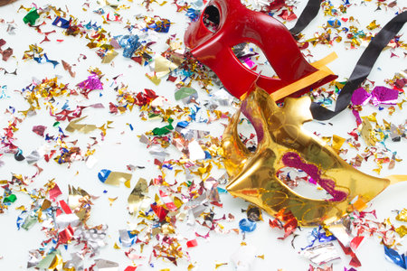 Mardi Gras mask and confetti on a white background.の写真素材
