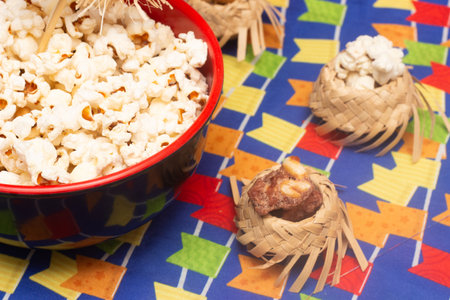 Popcorn in bowl on colorful fabric background. Selective focus.の写真素材