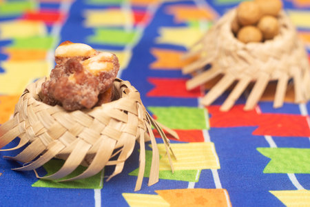 Nuts in bamboo basket on colorful fabric background, Thai dessert.の写真素材