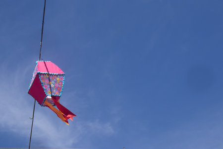 Kite flying in the blue sky, with space for text.の写真素材