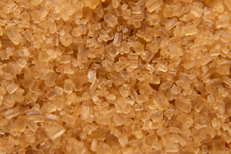 brown cane sugar as a background, close-up, macro shotの写真素材