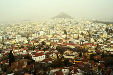 View of the neighborhoods of Anafiotika and Plaka in a winter day, from the Acropolis of Athens Greeceのeditorial素材