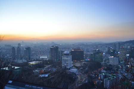 Seoul night, South Korea, 12-19-2012: Cityscape at N Seoul Tower during the sunset. Panorama from the top of the city, South Koreaのeditorial素材