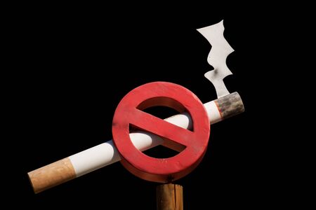 Non smoking sign isolated on blackの写真素材