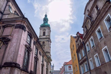 Church of the Assumption of the Blessed Virgin Mary (KoÅciÃ³Å Wniebowzcji NajÅwiÄtszej Marii Panny) surrounded by historical buildings of the Old Town in Nysa, Poland.の写真素材
