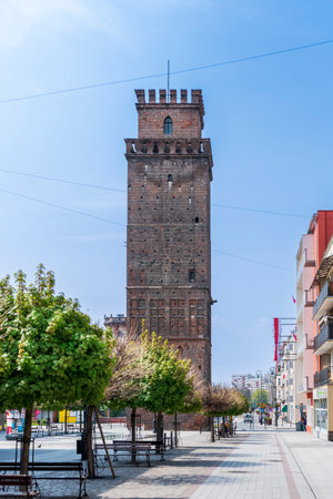 Nysa, Poland - May 1, 2022: ZiÄbice Tower. Medieval gate tower. A gothic building made of red bricks. The view from BolesaÅawa KrzYWoustego streetのeditorial素材