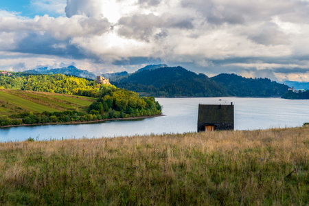 Panorama of the Czorsztyn Lake. Castle in Niedzica and Czorsztyn in the background. Beautiful mountain landscape. Lagoon of the Pieniny Landscape Parkのeditorial素材