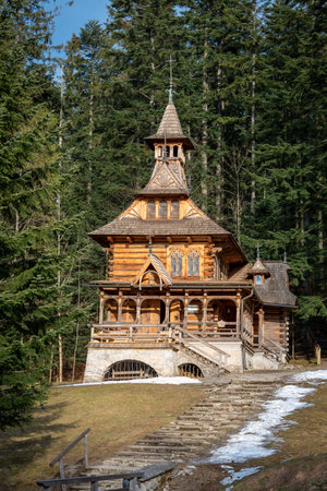 Zakopane style chapel called "JaszczurÃ³wka". A small wooden chapel covered with shingles. Zakopane, Polandの写真素材